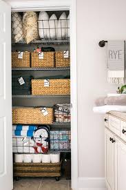 How To Linen Closet Organization Organizing Linens Linen Closet Closet Organization Diy