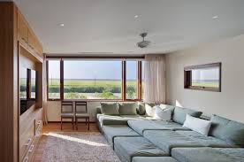 The house's palette is very restrained: Hamptons Beach House By Aamodt Plumb Architects