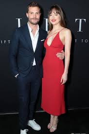 She appears serene, but just beneath the surface. Dakota Johnson Rotes Partykleid Fifty Shades Freed La Premiere Thecelebritydresses