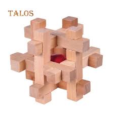Inside a wooden frame are 7 cylindrical pieces, of different lengths. Buy Wooden Kong Ming Luban Lock Ball In Cage Puzzle Educational Toys Brain Teaser Funny Baby Toy At Affordable Prices Free Shipping Real Reviews With Photos Joom