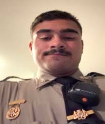 Officers pulling over a vehicle