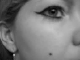She has slightly tan skin (much lighter than kyanna's) and bright blue eyes with a beauty mark just below her left eye. Where Have Beauty Marks Gone Are These Moles Dangerous Dr Branman