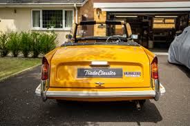 Image result for Herald Yellow 1975 Subaru