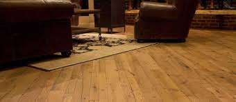Reclaimed and aged wood floors. Distressed Hardwood Flooring 9 Design Ideas With A Cozy Distressed Look