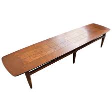 Combining the feel of a farmhouse essential with rivet details that look right at home in an industrial loft, this coffee table is a functional and fashionable addition to your seating group. Vintage Lane Altavista Surfboard Coffee Table At 1stdibs
