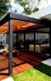 Before buying a kit, make sure the dimensions would fit with the area you have in mind. Backyard Modern Pergola Designs Attached To House Novocom Top