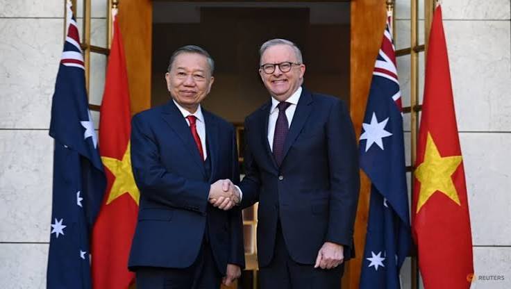 Australian and Vietnamese officials meeting to discuss the expansion of their strategic partnership and regional security cooperation.
