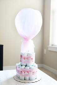 The straws just slide in the top tier of the diaper cake. Diaper Cake Baby Shower Centerpieces Abby Lawson