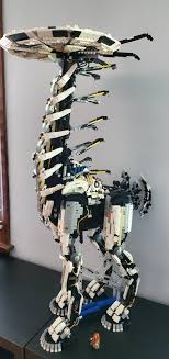 When the tallneck comes around jump onto its back and climb the climb holds sticking out its neck to get on its head. Horizon Zero Dawn Tallneck Gaming