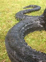 Rubber Art Detail Of A Snake Tire Art Sculpture Art Outdoor Sculpture