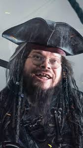 What are the key features of a model railroad track with a pirate flag?