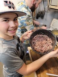 Delicious BBQ ribs with collard greens and cornbread