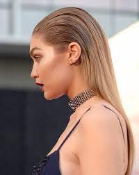 20 Holiday Party Hairstyles To Copy This Season Slicked Back And Straight Gigi Hadid 2016 Sleek Back Hair Slick Hairstyles Sleek Hairstyles