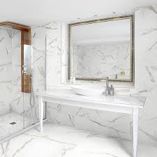 Whether You Re Designing A Commercial Or Residential Bathroom The Look Of Calacatta Gold P Porcelain Tile Bathroom Marble Tile Bathroom Gray And White Bathroom