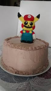 I really had a lot of fun making the mushrooms, stars and other characters for this cake. Pikachu Mario Bros Birthday Cake Cookie Connection