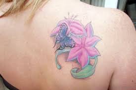 You can also incorporate different designs inside the butterfly's wings. 55 Beautiful Butterfly And Flower Shoulder Tattoos