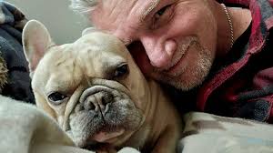 Why does my French Bulldog keep licking my feet and legs all the time?