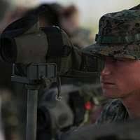 Lt. Jon Miller shows Capt. Sam Howard, commanding officer