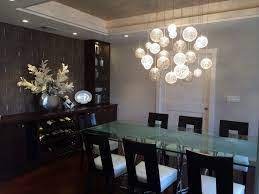 Of course, if you have larger rooms with higher ceilings, you can really indulge yourself with. Spring Fever With Trendy Floral Chandeliers In Your Dining Room Modern Dining Tables Dining Room Chandelier Dining Room Ceiling Lights Contemporary Dining Room Lighting