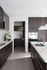 The classic contemporary kitchen design style is not a new thing but because contemporary refers to everything current it is a very dynamic style that keeps updating itself. Minosa Classic Modern Kitchen Design