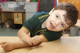 Mason Watts receives new wheelchair from Lions Club of Leeton