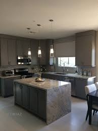 Stunning Gray Toned Kitchenremodel With Waterfall Granite Countertops Rated 1 In Az Www Twda Kitchen Remodel Kitchen Remodeling Services Kitchen Pictures