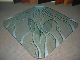 They are stronger, but they might break too. Glass Top Tables Featuring Custom Etched Designs Sans Soucie