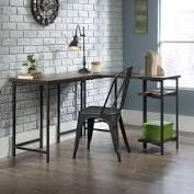 This room is an office by day and a bedroom by night. 190 56