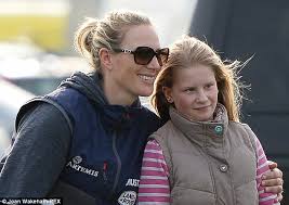 Zara phillips poses with her horse toy town after making a clear round to. Zara Phillips Gives Daughter Mia Grace No Nonsense Bottle At The Races Daily Mail Online