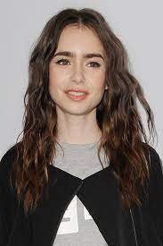 Lily collins recently transformed from a super sophisticated brunette to a fiery redhead. Lily Collins Hairstyles Hair Colors Steal Her Style