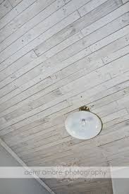 White Washed Ceiling I Made Using Pallet Wood I Added A Fun Industrial Style Light From Lowe S Pallet Ceiling White Wash Walls Mdf Wall Panels