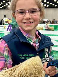 Here comes that Champion slap!!! Big 8 Expo… Kate had a great day.  🏆💥Champion American Heifer, Miss RH 435. 🏆💥Reserve Champion American  Heifer, Miss RH 452. Judge: Kash Allen