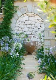 Stucco Wall With Stone Accent Garden Mediterranean Garden Dream Garden