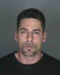 Suspect Charged in Heroin Death of LB Man