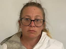 Woman charged in crash that killed 'Black-ish' producer's kids