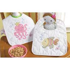 This is surly one of our most popular categories at everything cross stitch! The Mermaid Bay Stamped Cross Stitch Baby Bibs Kit From Bucilla Includes 2 Stamped Baby Bibs With Hook Loop Cl Baby Cross Stitch Kits Baby Cross Cross Stitch