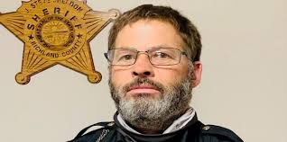 Sheriff's termination letter to captain cites no reason for dismissal