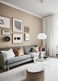The stunning furnishings and the dramatic coffered ceiling in this space is what initially drew many. Small Studio With Beige Walls Coco Lapine Design Cozy Living Room Design Beige Living Room Decor Beige Living Rooms