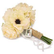 Make your own photo wedding bouquet charms to honor a missed loved one on your special day. Wedding Bouquet Photo Charm