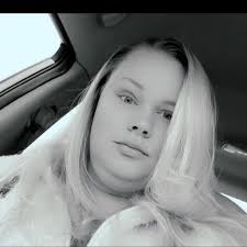 How to help a homeless woman in Racine, WI?