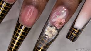 With the peach nail polish, create a frame by following the shape of the top of the triangle as shown. Acrylic Nails Tutorial Encapsulated Nails Peach Ombre Nails Acrylic Nails With Nail Forms Youtube