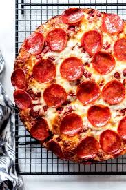 Cast Iron Pan Pizza Has A Crispy Fried Crust And A Thick Almost Focaccia Like Puffy Interior With Pizza Recipes Cast Iron Pizza Recipe Deep Dish Pizza Recipe