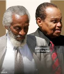 Michael Jackson's father Joe Jackson tries to make his way past the... News  Photo