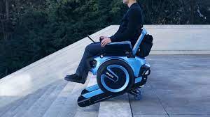 The stairs are climbed using two rubber tracks mounted on the bottom of the chair. Stair Climbing Wheelchair Conquers Steps Youtube
