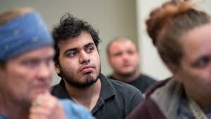 Barber Rich' delivers haircuts, life lessons during Titan Men of Diversity  Week