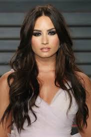 Long hair with blunt bangs. Demi Lovato S Hairstyles Hair Colors Steal Her Style Demi Lovato Hair Color Demi Lovato Hair Demi Lovato Pictures