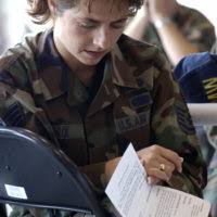 US Air Force (USAF) STAFF Sergeant (SSGT) Brent Niles participates in a  litany reading during the First Annual flightline worship service and  picnic held in hangar Four at MacDill Air Force Base (