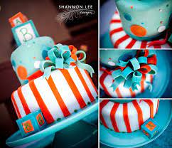 Pin By Jennifer Fullmer On Baby Shower Ideas Orange Baby Shower Baby Shower Cakes For Boys Baby Shower