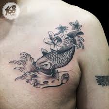 Black and grey koi fish tattoo. Small Koi Fish Black And Grey Tattoo On Chest Koi Tattoo Black Tattoos Koi Fish Tattoo