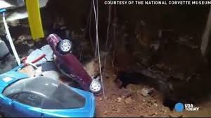 sinkhole swallow 8 corvettes at museum